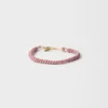 Brățară din piele Nappa împletită cu ornament metalic Brățară din piele Nappa împletită cu ornament metalic