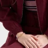 Brățară din piele Nappa împletită cu ornament metalic Brățară din piele Nappa împletită cu ornament metalic