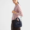 Geantă mini căptușită din Re-Nylon cu fundă Geantă mini căptușită din Re-Nylon cu fundă