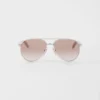 Ochelari de soare Prada cu plăcuța metalică iconică