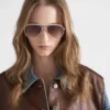 Ochelari de soare Prada cu plăcuța metalică iconică