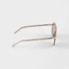 Ochelari de soare Prada cu plăcuța metalică iconică