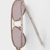 Ochelari de soare Prada cu plăcuța metalică iconică